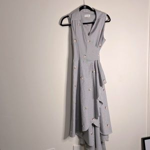 Calvin Klein sleeveless wrap dress showstopping piece asymmetrical in the bottom